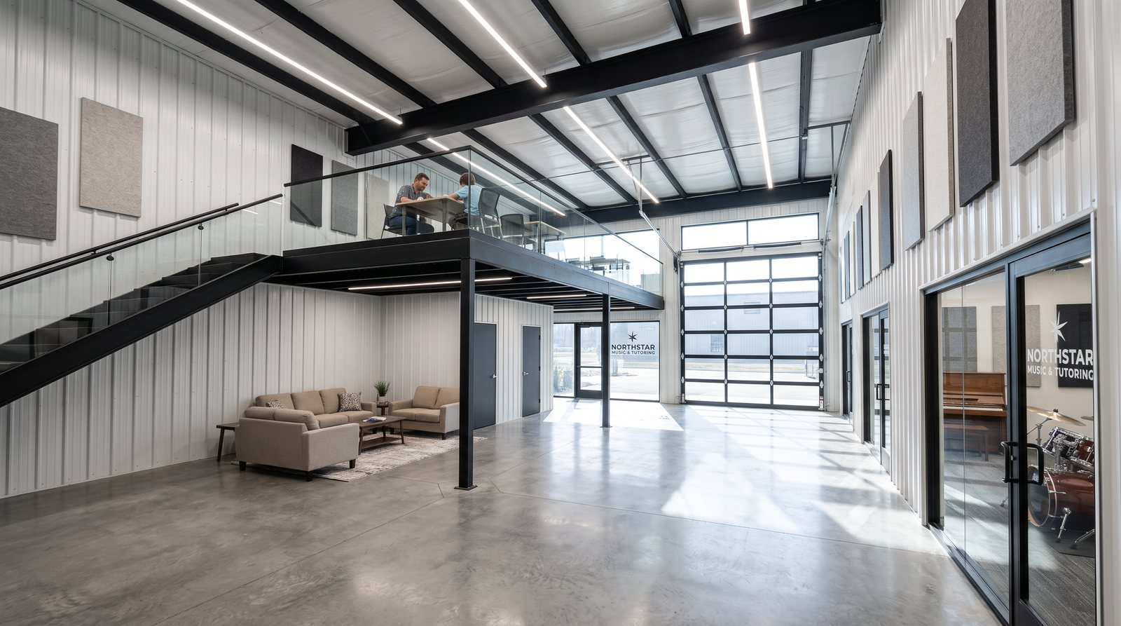 Example suite as a music and tutoring studio with glass lesson rooms and a study loft